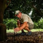 A farmer using Farmable- an app who helps growers to organize and manage operation in the fields.